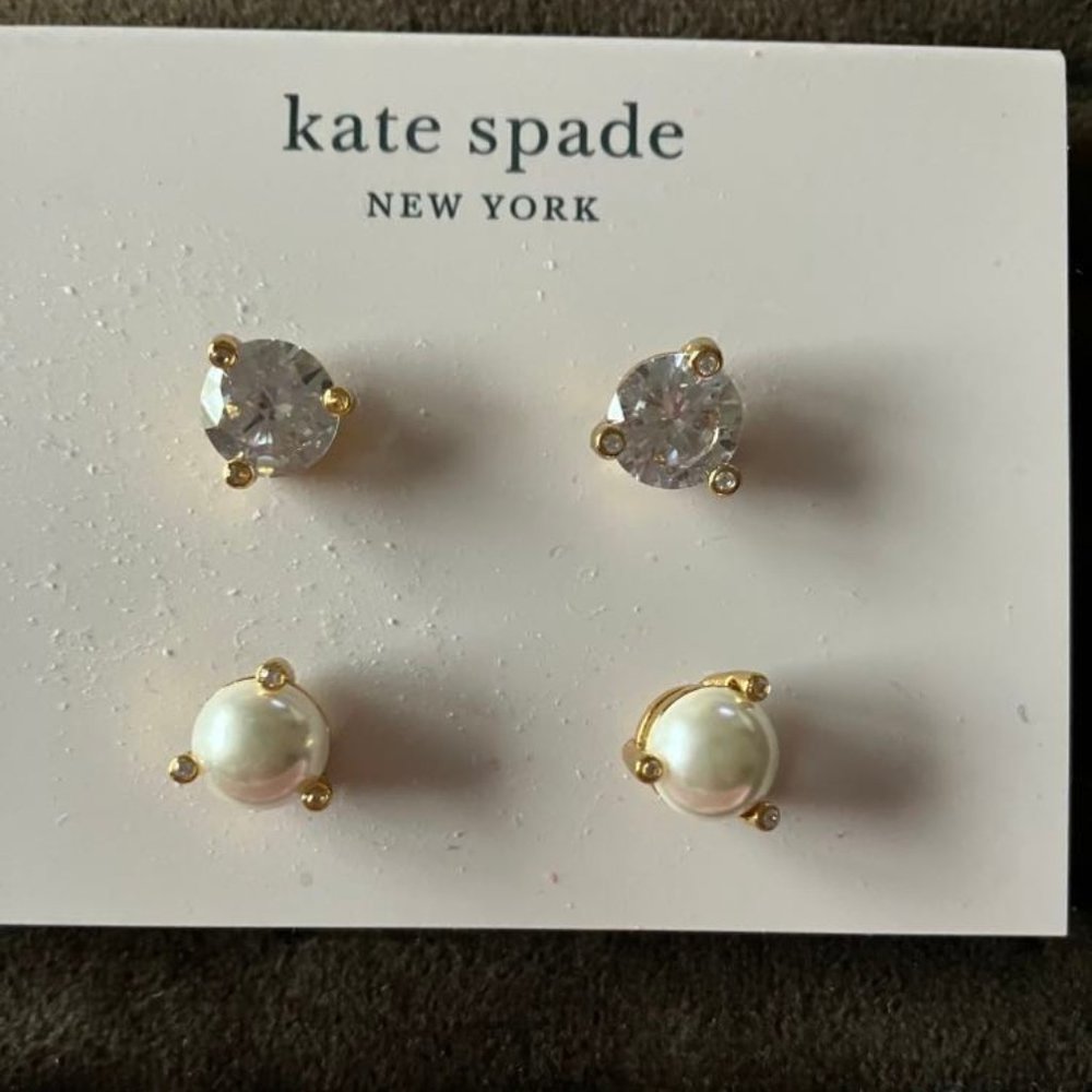 Two pair of Kate Spade New York earring studs with pink bag